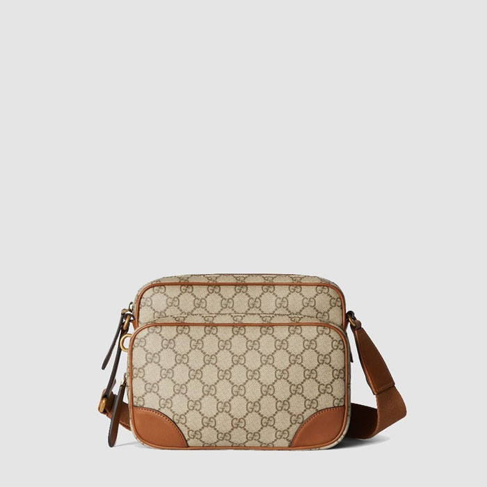 グッチメンズエンブレムエンボススーパーミニバッグb1